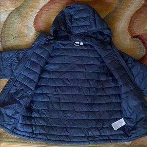 Dark blue light puffer jacket. Boys size Medium.